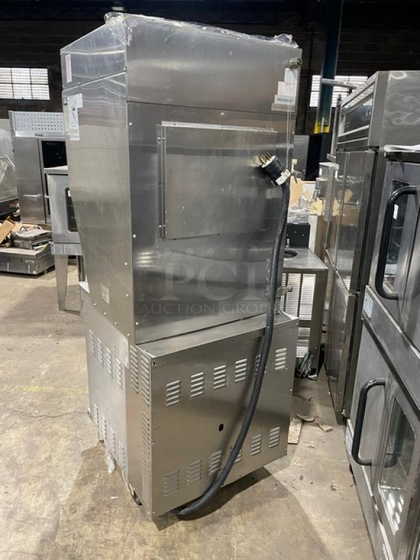 Wells VCS2000 stainless steel ventless cooking system with 4-French hot plate range, convection oven, and built-in Ansul system.