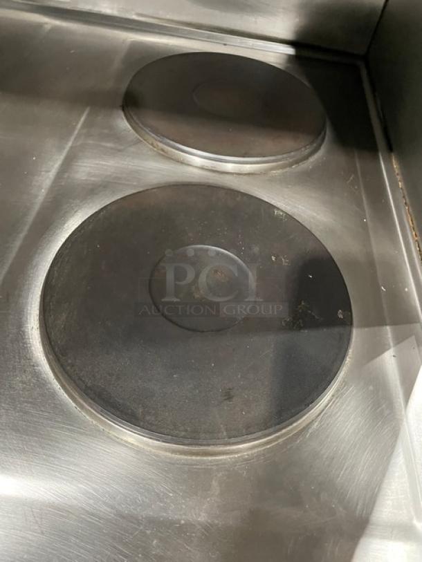 Wells VCS2000 stainless steel ventless cooking system with 4-French hot plates, convection oven base. Includes built-in Ansal system.