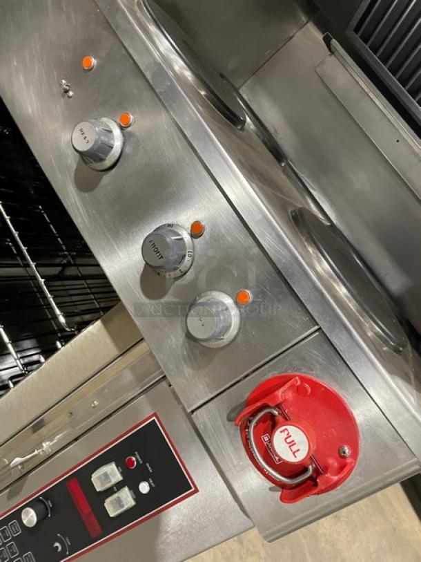 Wells VCS2000 stainless steel ventless cooking system with 4 hot plate range, convection oven, built-in Ansal system.