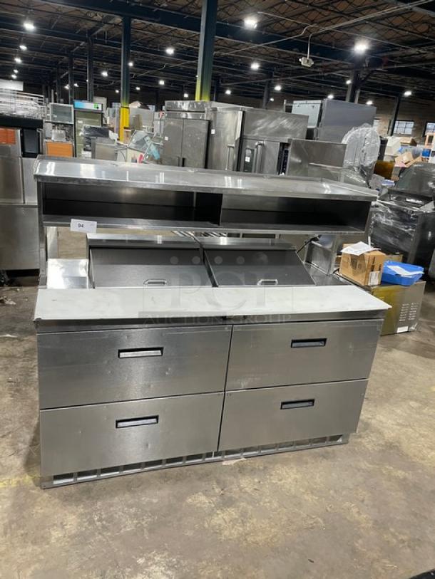 Delfield stainless steel 4-drawer refrigerated prep table, model UCD4464N12DD5, with overhead shelf and cutting board.