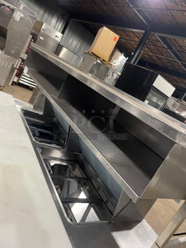 Delfield UCD4464N12DD5 stainless steel prep table with 4 drawers, bain marie, enclosed shelf, cutting board. 115V, 1 phase.