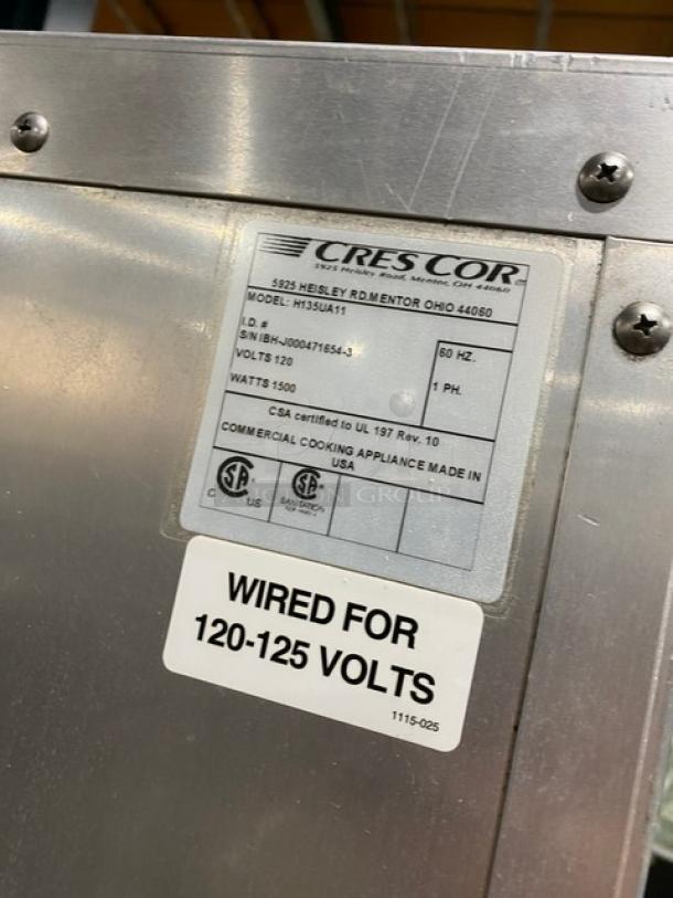 Cres-Cor Model H135UA11 stainless steel insulated holding cabinet, 120V, single section, on casters, with voltage markings.