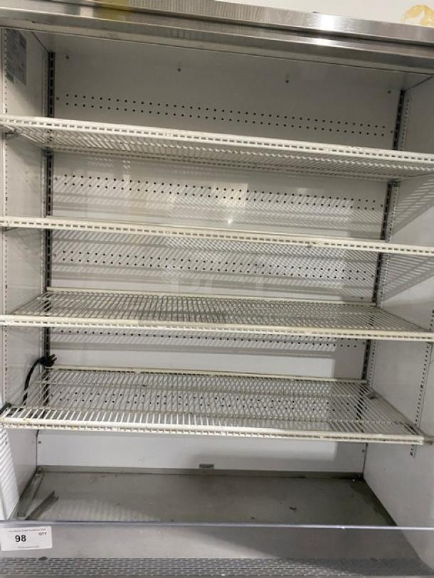 True TAC-48-LD stainless steel refrigerated open merchandiser with adjustable poly-coated racks, on legs, 208-230V, 1 phase.