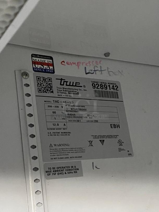 True TAC48LD commercial refrigerated display case label; model TAC-48-LD, SN 9289142. Features Made in USA sticker.