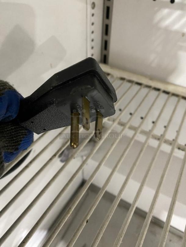 True Commercial Stainless Steel Refrigerated Open Merchandiser, Model TAC48LD, with adjustable wire rack, 208-230V plug.