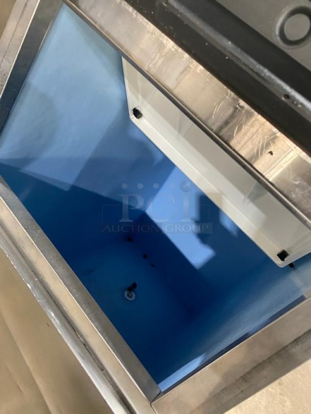 Hoshizaki KM-515MAH stainless steel ice maker head/bin combo, air-cooled, Energy Star certified, 115V, on legs.