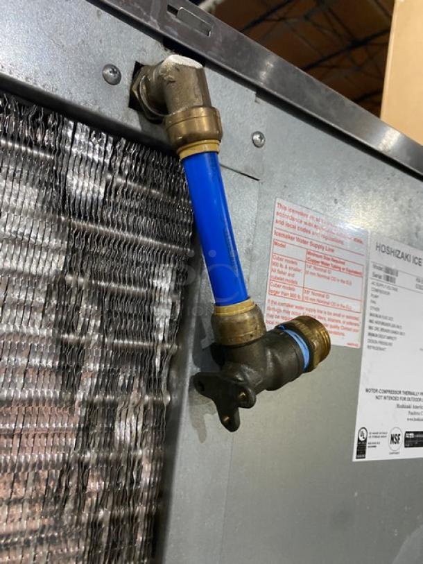 Hoshizaki KM-515MAH ice machine with visible water connection and label showing product details, in good condition.