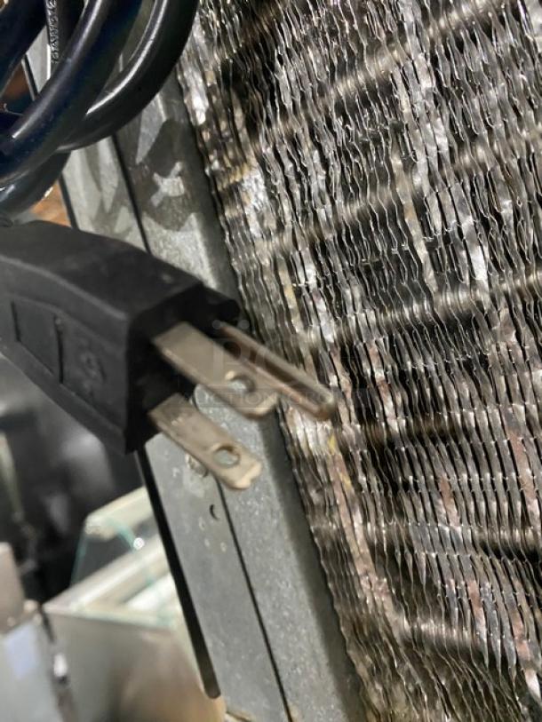 Hoshizaki KM-515MAH ice machine, air-cooled, stainless steel, electric, Energy Star certified, visible power cord.