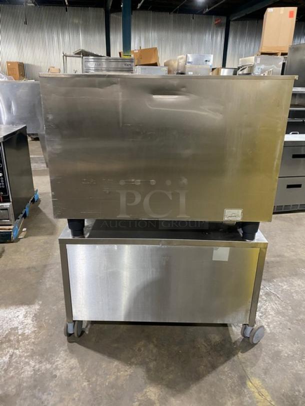 Rational SCCWE62G commercial stainless steel combi oven with 2-section pan stand, 6-pan capacity, on casters, natural gas powered.