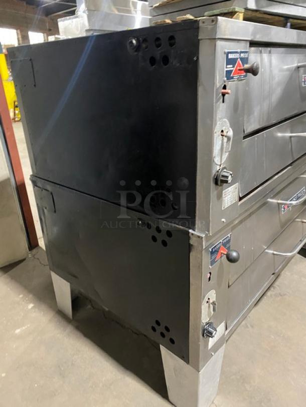 Bakers Pride stainless steel gas double deck pizza oven, SN 5732, with stones, on legs, commercial use, good condition.