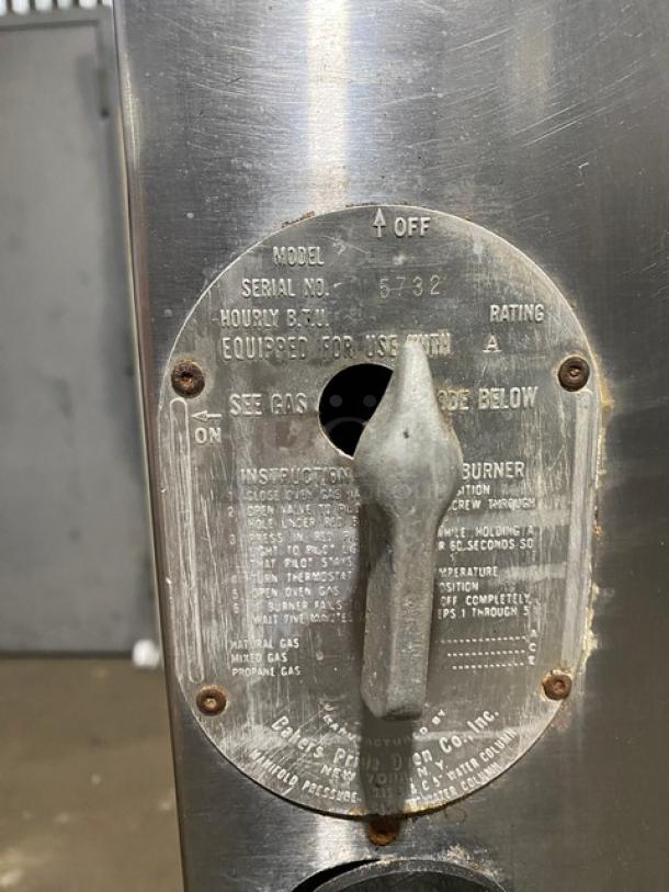 Bakers Pride commercial stainless steel double deck gas pizza oven, SN 5732, includes stones, on legs, control panel shown.