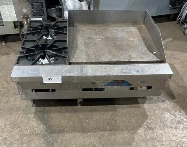 Comstock-Castle FHP3624 stainless steel countertop 2-burner split top griddle range, with back & side splash, on legs.