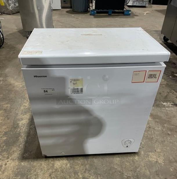 Hisense commercial white chest freezer, model WFC070M6RWD. Features visible labels, minor surface wear, 115V.