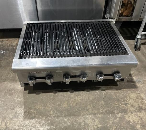 Turbo Air Radiance Series commercial gas char broiler with stainless steel finish, cast iron grates, and adjustable legs.