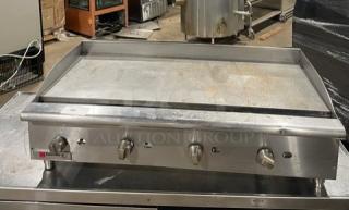 Cecilware Pro Series stainless steel gas countertop flat griddle with back and side splash, on legs, in used condition.