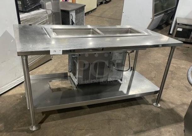 Delfield stainless steel 2-well refrigerated food table, model 8148EFNP, electric, single undershelf, on legs, used condition.