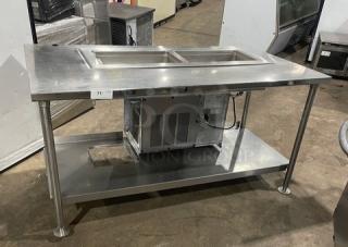 Delfield stainless steel 2-well refrigerated food table, model 8148EFNP, electric, single undershelf, on legs, used condition.