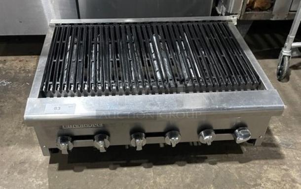 Turbo Air Radiance Series commercial gas char broiler with stainless steel finish, cast iron grates, and adjustable legs.
