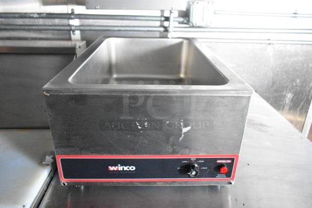 Winco food warmer in stainless steel, featuring temperature control dial. Used condition with visible wear.
