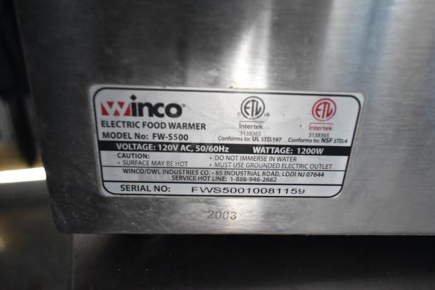 Winco Electric Food Warmer label showing model FW-S500, 120V AC, 1200W. Includes caution and contact details.