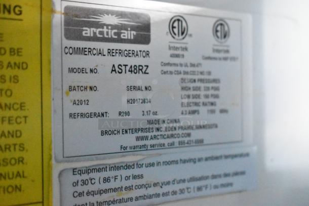 Label on Arctic Air commercial refrigerator, Model AST48RZ, refrigerant R290, serial H20173634, 3.17 oz capacity.