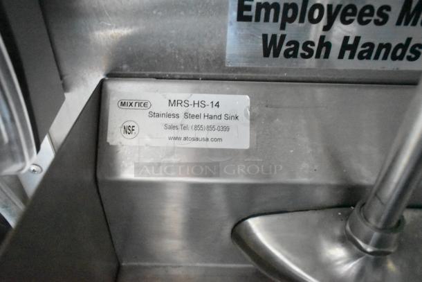 Stainless steel hand sink in Cruising Kitchens food trailer, labeled Mix Rite MRS-HS-14, NSF certified, for commercial use.