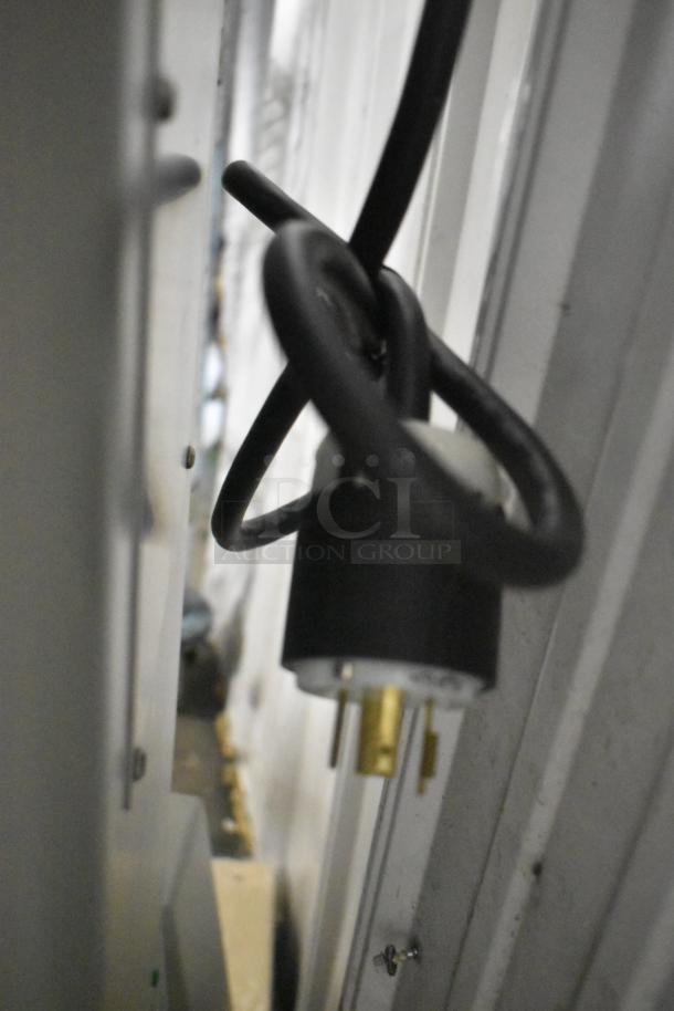 Electrical plug for Globe SP80 commercial dough mixer, featuring three-phase, 220-volt compatibility.