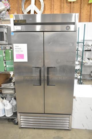 True T-35 stainless steel commercial 2-door reach-in cooler. Features 115 volts, 1 phase. Visible item label marked "TRUE REFIRGE ITEM# T-35."