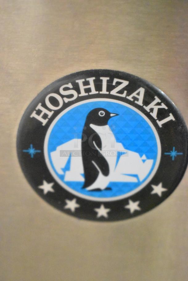 Hoshizaki DCM-271BAH-OS logo on stainless steel, featuring a penguin and stars.