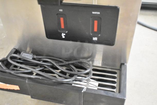 Hoshizaki DCM-271BAH-OS stainless steel touchless ice and water dispenser. Features ice and water buttons, visible power cord.