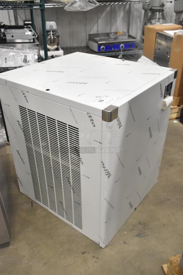 Manitowoc RFS0650A stainless steel ice head, brand new scratch and dent, 220 volts, 1 phase, protective film on surface.