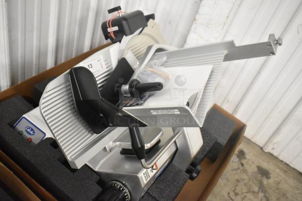 Brand new Globe S13 stainless steel manual meat slicer, 13" blade, with sharpener, 110V, commercial-grade, countertop model.