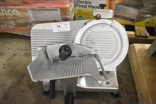Brand new Globe G12 stainless steel 13" manual meat slicer with blade sharpener. 115 volts, 1 phase.