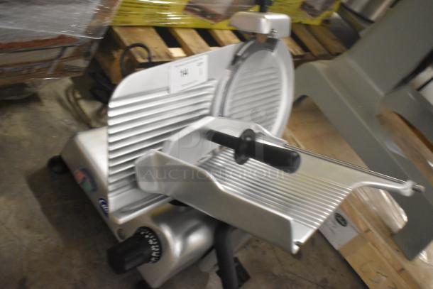 BRAND NEW Globe G12 stainless steel meat slicer, 13" blade, manual operation, countertop design, includes blade sharpener.