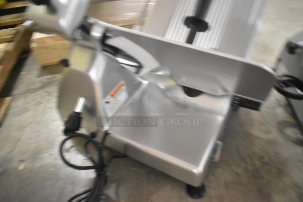 Brand new Globe G12 stainless steel commercial 13" meat slicer, heavy-duty manual with blade sharpener, 115V, 1 phase.