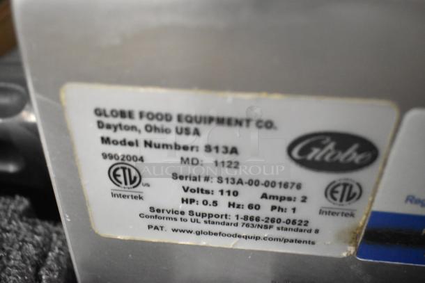 BRAND NEW Globe S13A stainless steel commercial 13" meat slicer with blade sharpener. 110V, 1 phase. ETL certified.