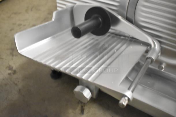 BRAND NEW Globe C10 stainless steel meat slicer, 13" blade, manual, with sharpener, 110V, for commercial use.
