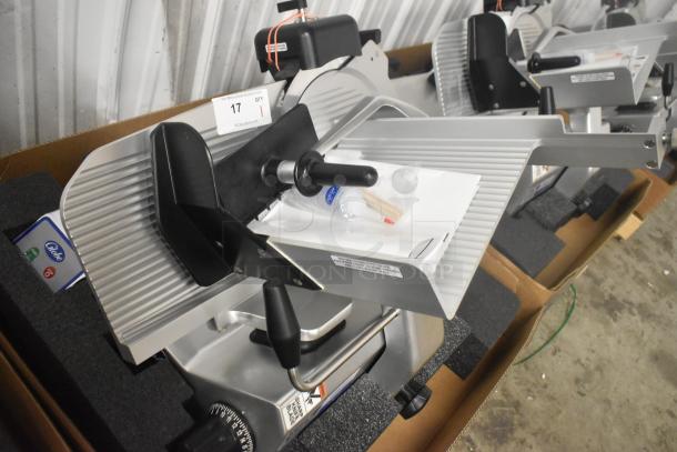 Brand new Globe S13-05 commercial 13" stainless steel meat slicer with blade sharpener, 220 volts, 1 phase.