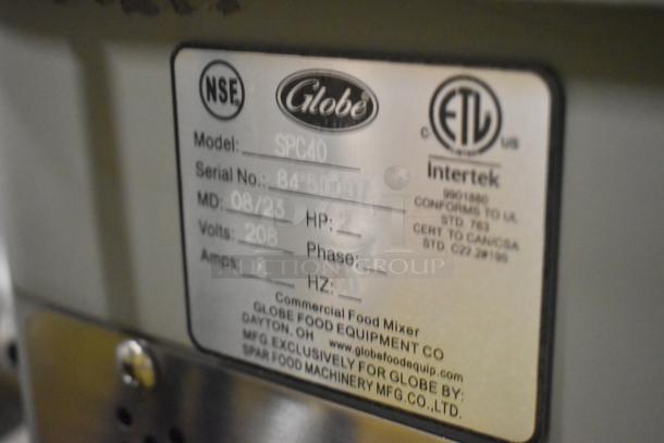 Globe SPC40 metal commercial dough mixer label; shows model, serial number, 208V, 3 phase.
