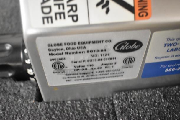 Globe SG13-84 meat slicer label, showing model number, serial number, and electrical specifications.