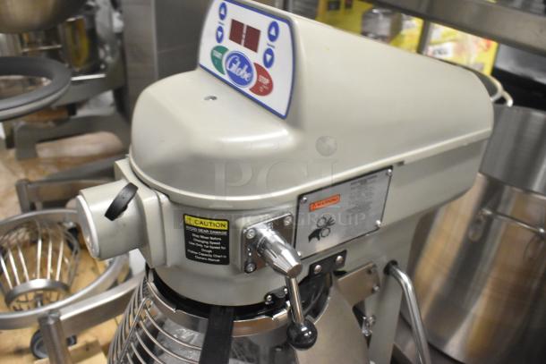 Brand new Globe SP20 commercial dough mixer, 20-quart capacity, 110 volts, with bowl guard and control panel indicators.