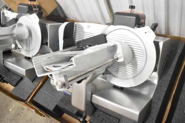 Brand new Globe S13A-51 stainless steel commercial countertop 13" meat slicer with blade sharpener, 2022 model.