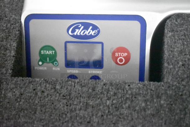 Globe S13A-51 control panel close-up, features start/stop buttons. Stainless steel, commercial-grade, with blade sharpener.