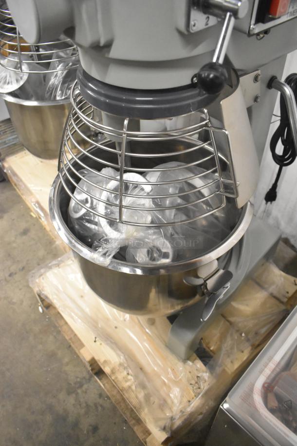 Brand new 2023 Centaur MAC20 20-quart planetary dough mixer with bowl guard, dough hook, and whisk attachments.
