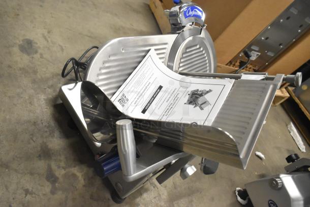 Globe GC512 stainless steel meat slicer, brand new, with blade sharpener. Includes manual, 110 volts, 1 phase, commercial use.