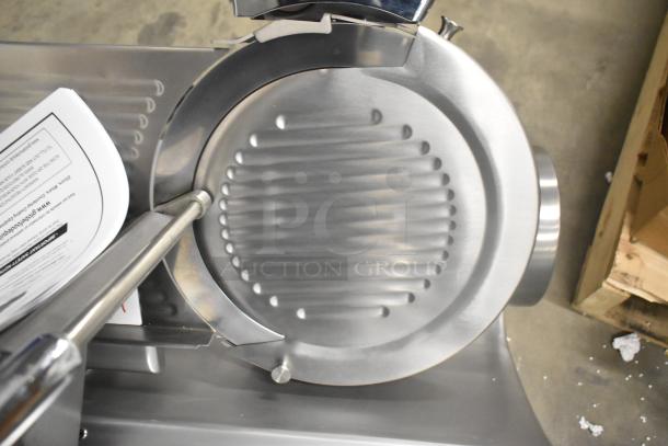 Brand new Globe GC512 stainless steel meat slicer with blade sharpener. Features include medium duty design and 110V power.