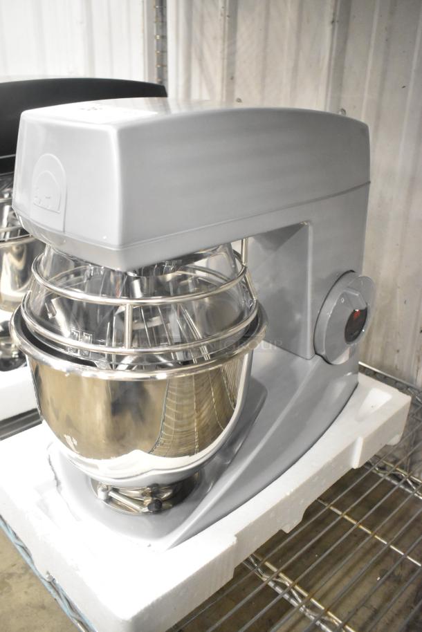 Brand new Varimixer V5A Teddy 5 Quart countertop dough mixer with mixing bowl, bowl guard, whisk, paddle, and dough hook.