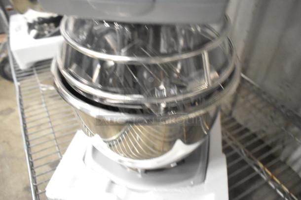 Brand new Varimixer V5A 5 Quart Dough Mixer with bowl, guard, whisk, paddle, and dough hook attachments shown.