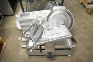 Brand new Globe stainless steel commercial meat slicer with manual operation and blade sharpener. 110V, 1 phase.