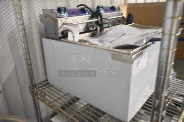 Brand new Globe PF32E stainless steel commercial countertop electric fryer with two metal fry baskets, 208/240V, 1 phase.